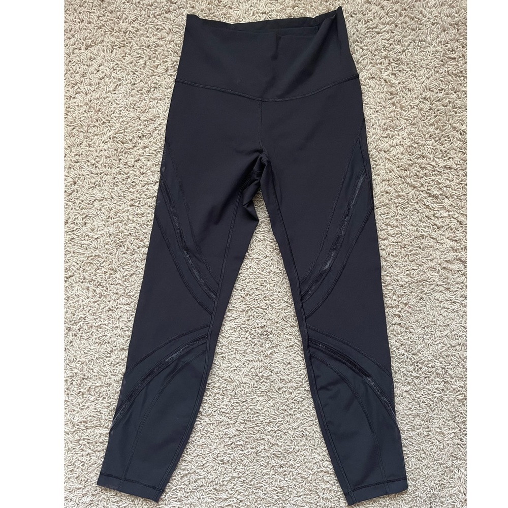 Black leggings 24” inseam with see-through design cuts size 6